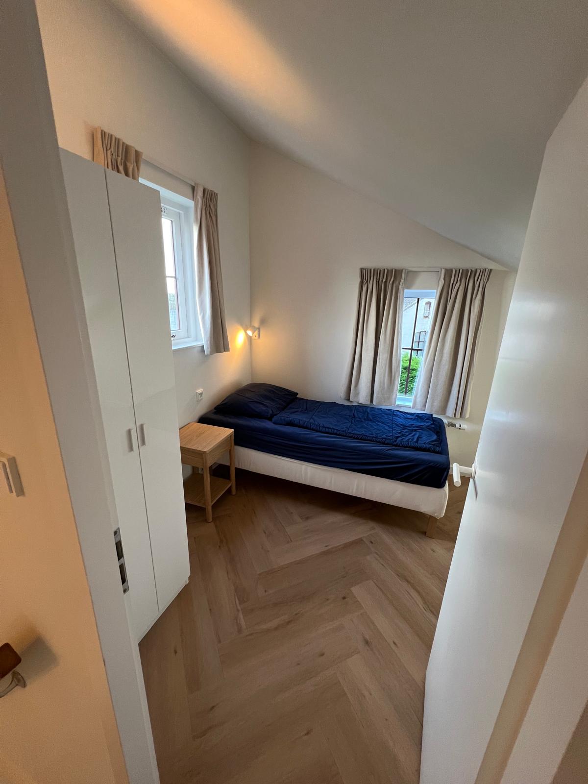 Slaapkamer #1 boven vakantiehuis Texel bij De Krim